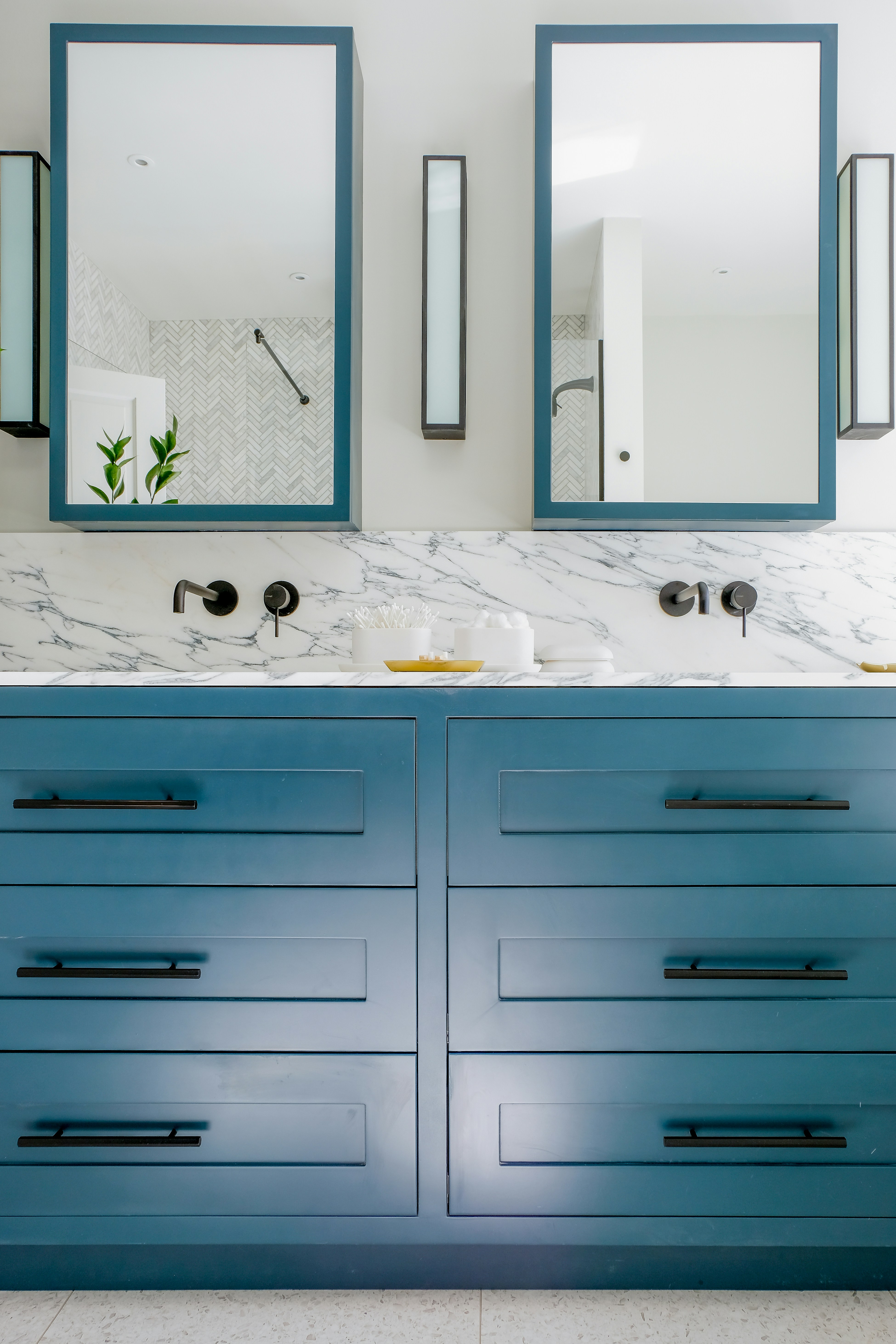 Bathroom vanity with marble top Photo by <a href="https://unsplash.com/@sam_yink?utm_content=creditCopyText&utm_medium=referral&utm_source=unsplash">Sam Yink</a> on <a href="https://unsplash.com/photos/white-wooden-kitchen-cabinet-with-sink-BE8KcGDG9F8?utm_content=creditCopyText&utm_medium=referral&utm_source=unsplash">Unsplash</a>